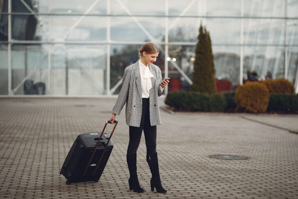 Traveler using a smartphone